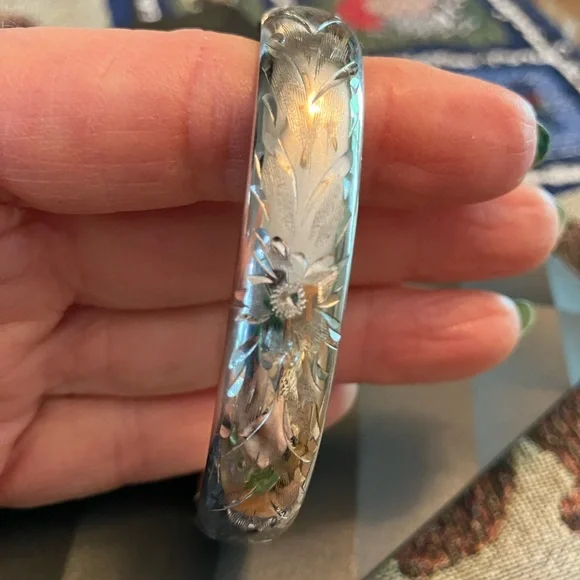 Classic Sterling Silver Polished Bangle Bracelet with Floral Design
